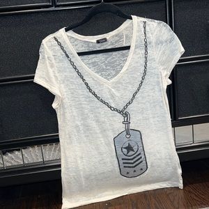 NWOT T-SHIRT WITH GRAPHIC DETAIL AND SILVER STUDS